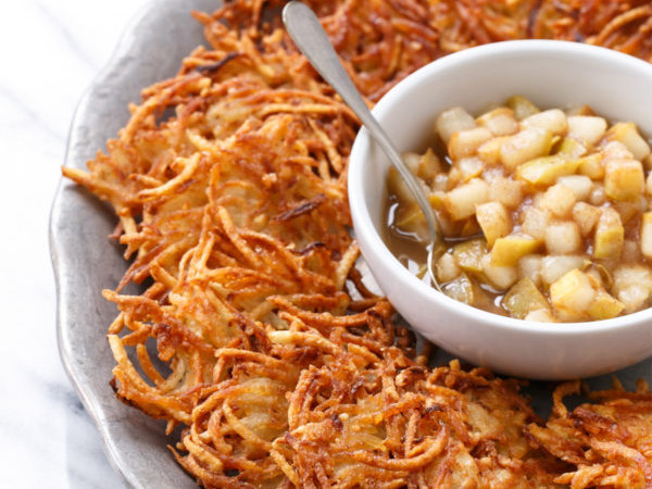 Potato Latkes Served with Caramelized Pears, Creamy Goat Cheese, and Sherry Vinegar