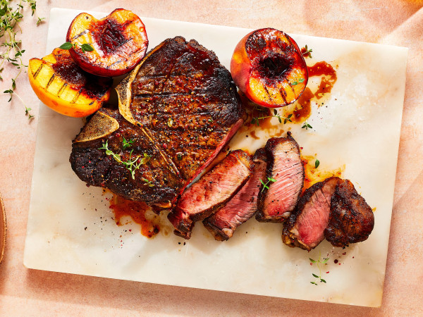 Cumin Lamb Steaks Served with Smashed Potatoes, Wilted Spinach, and Red Wine Reduction