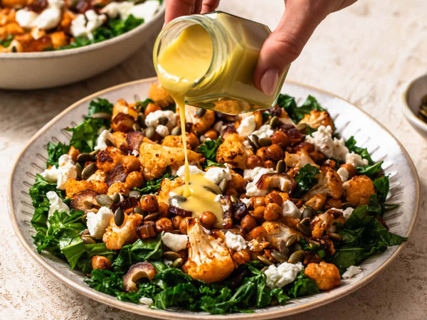 Roasted Cauliflower Accompanied by Kale Chips and Citrus