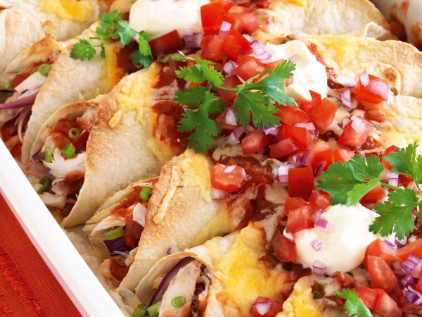 Spicy Chicken Enchiladas Drizzled with Tomatillo Salsa