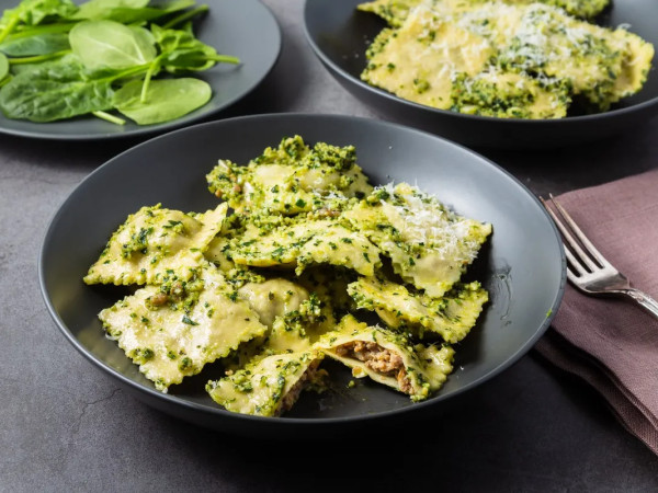 Pesto-Sauced Ravioli Filled with Sausage and Ricotta