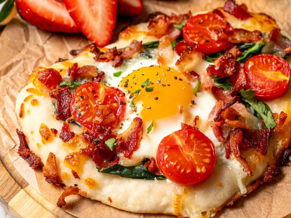 Morning Pizza topped with Bacon, Eggs, and Spinach