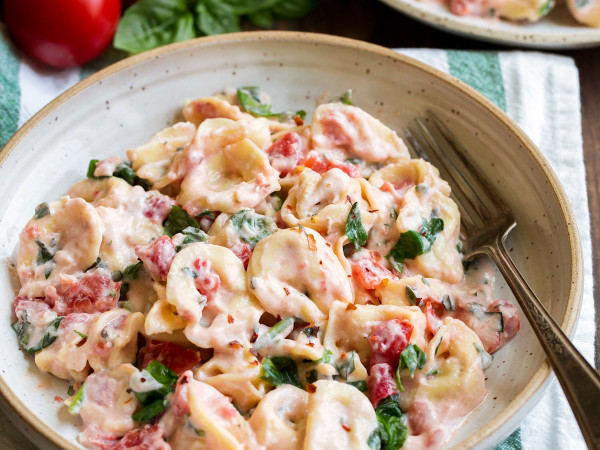 Tortellini with Creamy Spinach and Tomato Sauce