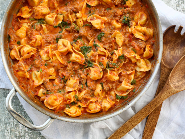 Cheese Tortellini and Italian Sausage in a Rich Mushroom-Spinach Sauce
